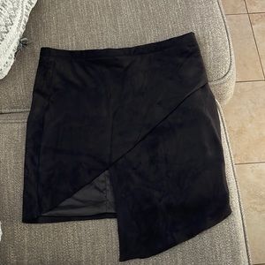 Womens black suede asymmetrical skirt. Size medium